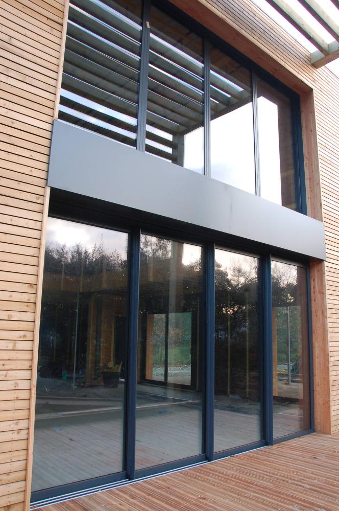 9Ensemble Coulissant + fixe vitré